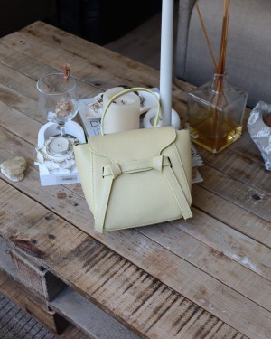 butter yellow şerit detaylı tutma saplı el omuz çantası