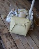 butter yellow şerit detaylı tutma saplı el omuz çantası